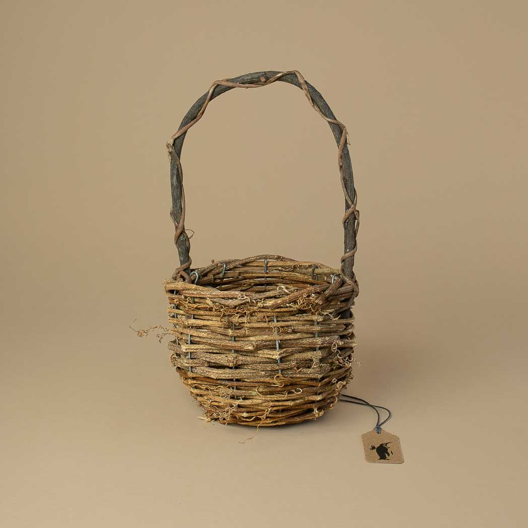 small-round-brown-woven-basket-with-long-thin-handle